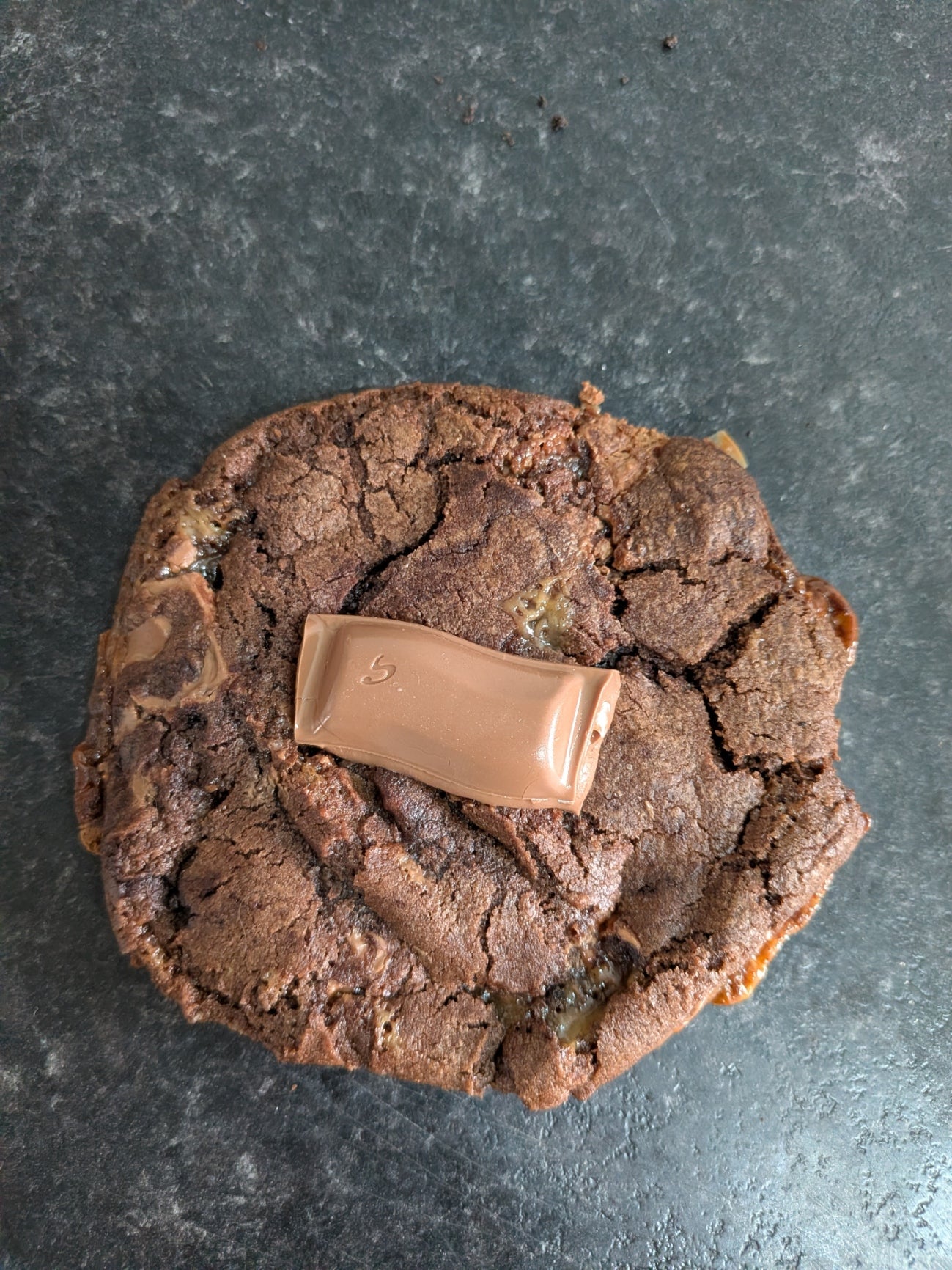 GALAXY CARAMEL COOKIE:

"Galaxy caramel cookie with smooth chocolate"
"Handmade Galaxy cookie with caramel pieces